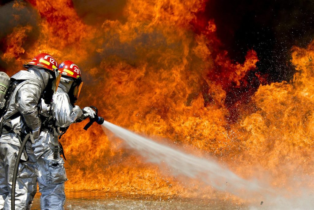 Fireman extinguishing a fire