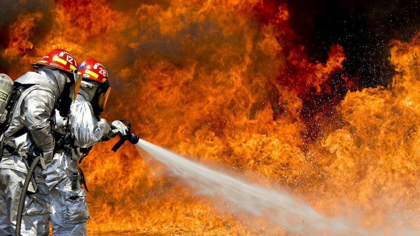 Fireman extinguishing a fire