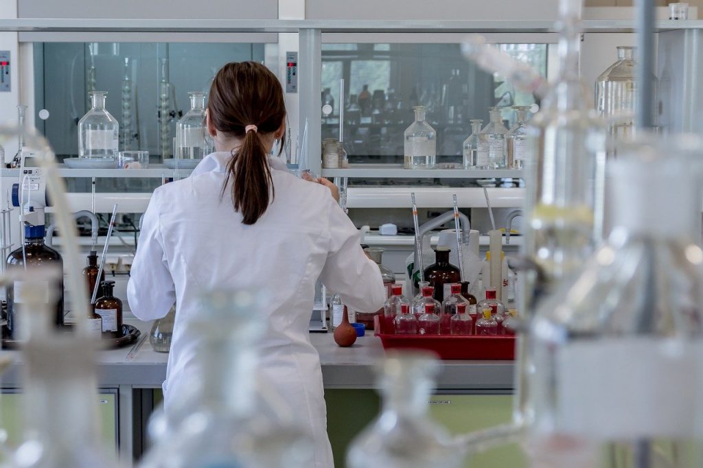 Woman performing brain tumour research