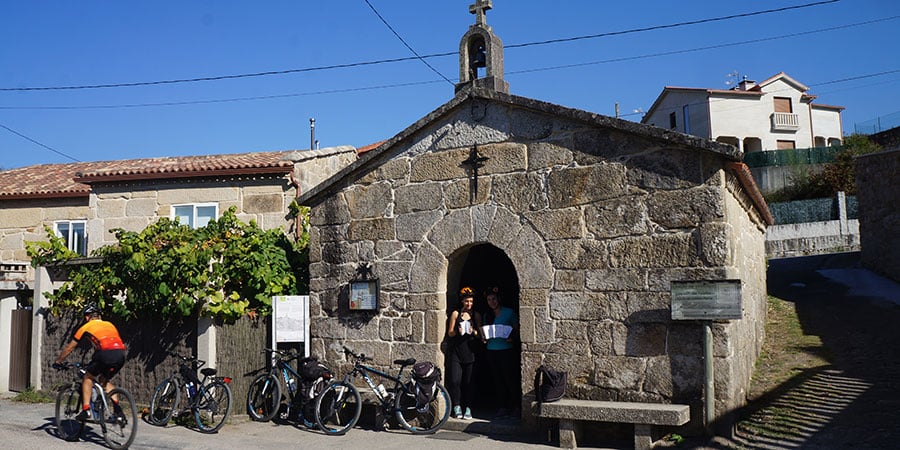 walking the camino stamping pilgrim passport chapel camino portugues caminoways