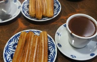 Eating churros with hot chocolate while on the Camino